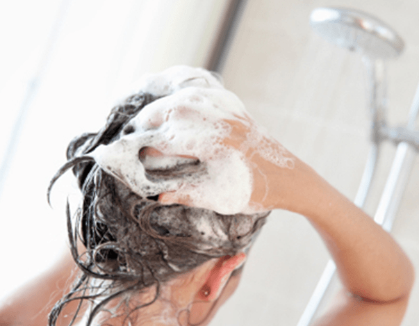 Photo Of A Woman Washing Her Hair Hair Transplants Los Angeles And 5051