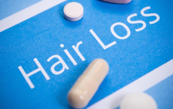 Does hair loss medication treat covid-19